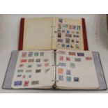 An album of mint and used stamps, contents ranging from British Honduras to Oman, together with