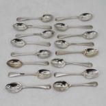 A matched set of 16 silver teaspoons in the Old English pattern, various dates and makers, 10.3oz