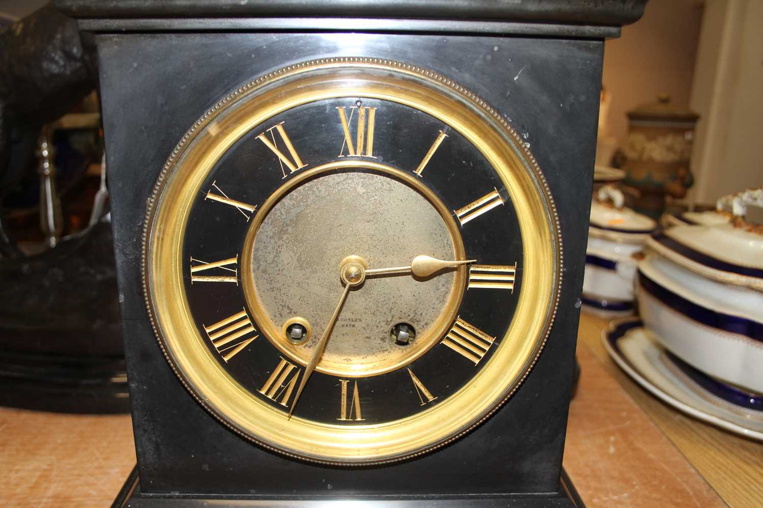A 19th century black slate mantel clock, the chapter ring showing gilt Roman numerals, having 8- - Image 2 of 2