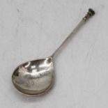 A George V silver seal topped spoon in the James I style, having a fig shaped bowl with engraved