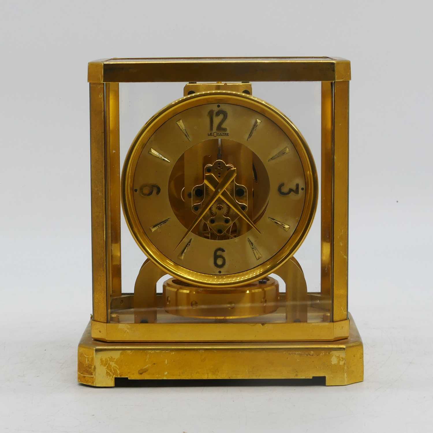 A Jaeger le Coultre Atmos clock, housed in a gilt brass and glazed case, the chapter ring stamped Le