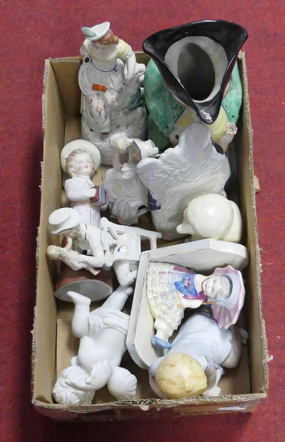 A collection of ceramics to inlcude a Staffordshire Toby jug, and a Staffordshire flat back figure