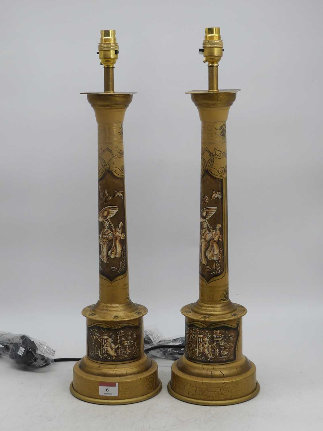 A pair of table lamps, each in the form of a Doric column, chinoiserie decorated with various