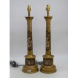 A pair of table lamps, each in the form of a Doric column, chinoiserie decorated with various