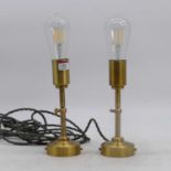 A pair of modern brass adjustable table lamps, each inscribed "Hoi p'loy, Cape Town", height 32cm