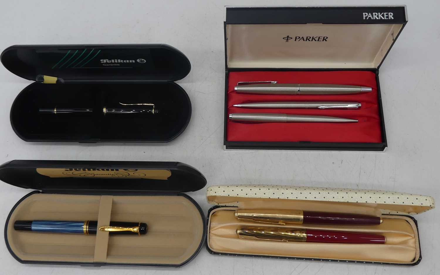 A Parker fountain ballpoint pen and pencil set, together with various other pens to include