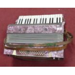 A Francesco pearloid cased accordion