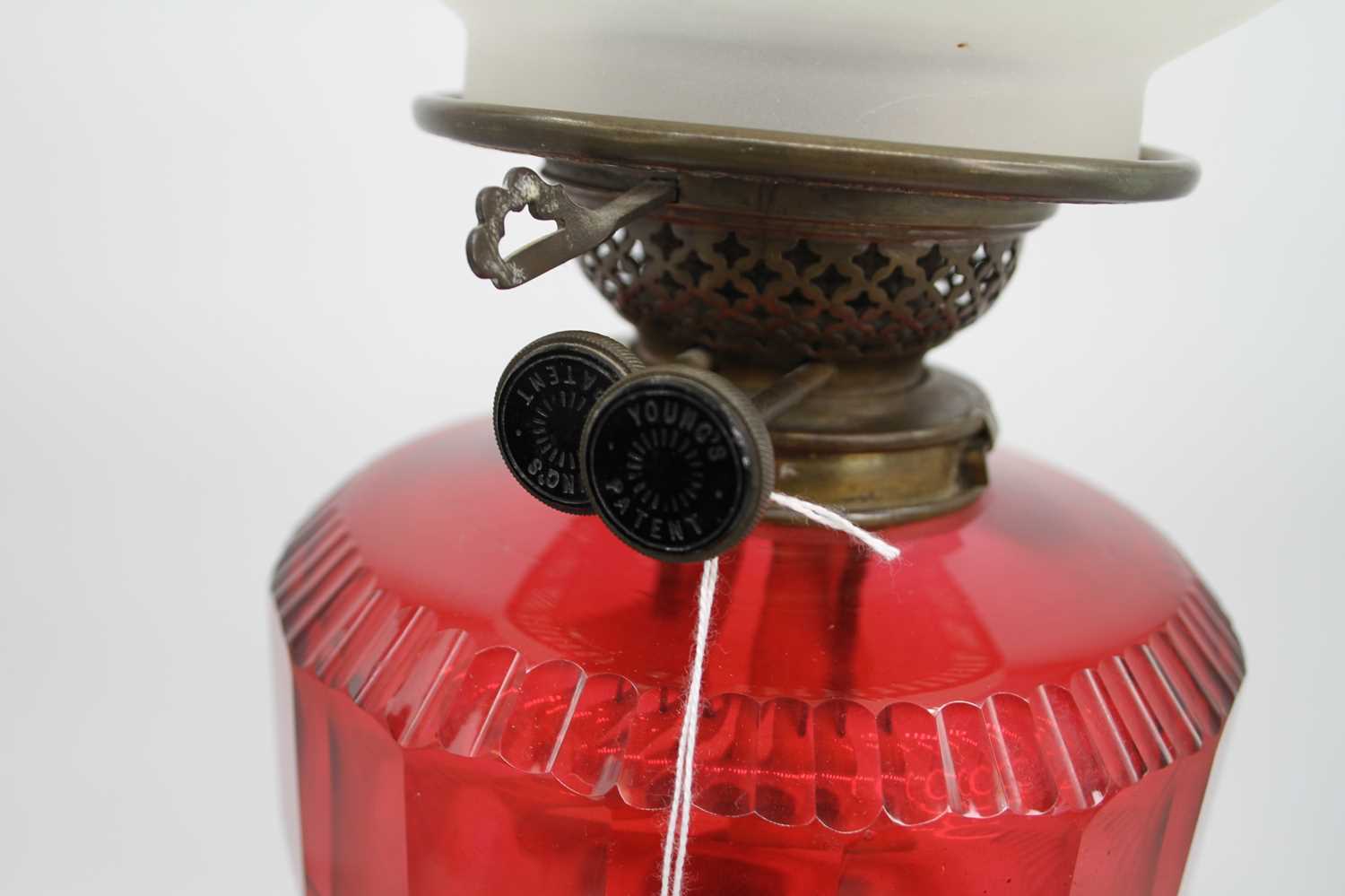 A Victorian oil lamp, having etched frosted glass shade, on Young's Patent burner and cranberry - Image 2 of 6