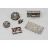 A continental silver eight division pill box with floral engraved decoration, import marks for