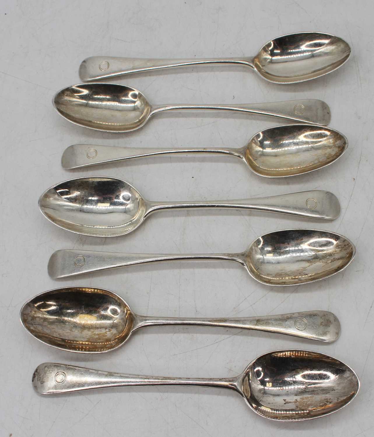 A matched set of eight Victorian and later silver tablespoons in the Old English pattern, London
