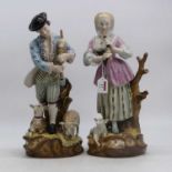A pair of porcelain figures, each shown in 18th century dress, besides sheep, height 43cm