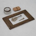 A silver photograph frame mount together with a cut glass salt with a silver rim, a silver golf tee,