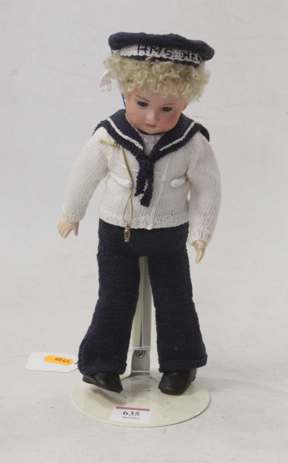 An early 20th century Armand Marseilles bisque head doll, in the form of a sailor, having painted
