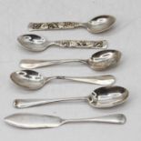 A pair of mid 20th century Danish silver teaspoons each having pierced handles with foliate