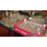 Four boxes of glassware, to include cut glass decanters, wine glasses, champagne flutes and