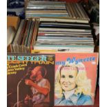 Two boxes of vintage LPs to include Tammy Wynette, Anna McGoldrick, and Pete Seger