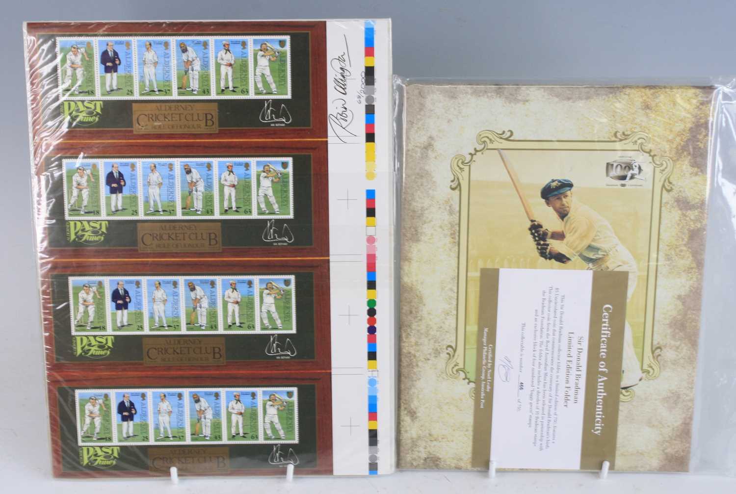 A collection of cricket ephemera to include Sir Donald Bradman Limited Edition Folder no. 466/750,