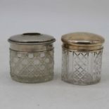 A George V cut glass dressing table jar with a silver lid, Birmingham 1923, together with a