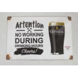 An enamel sign inscribed 'Guinness - Attention no working during drinking hours', 20 x 30cm