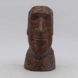 A terracotta model of an Easter Island head, height 26cm