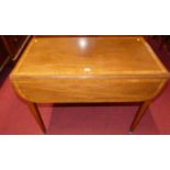 A 19th century mahogany and satinwood crossbanded Pembroke table, having rounded fall leaves, single