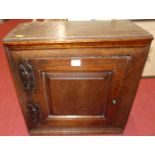 An 18th century joined oak single door table cupboard, 50.5 x 50cm