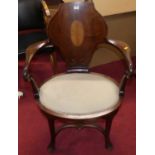 A circa 1900 mahogany and satin wood inlaid panelled tub back elbow chair, having shepherd's crook