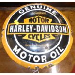 A convex enamel advertising sign for Harley Davidson Motorcycles, dia.29cm