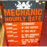 A printed tin sign for Mechanic Hourly Rate, 70 x 50cm