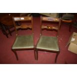 A set of four mahogany bar back dining chairs in the Regency taste