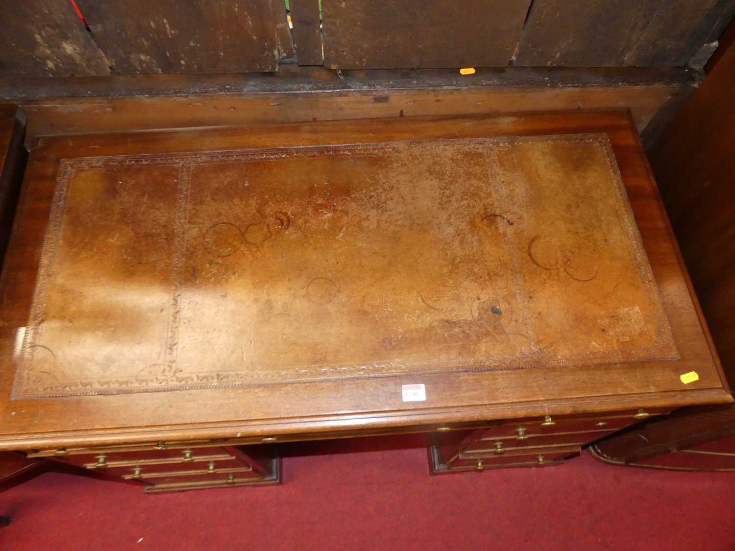 A circa 1900 mahogany and tan leather inset twin pedestal writing desk, having an arrangement of 9 - Image 2 of 2