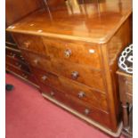 A mid-Victorian mahogany and flame mahogany round cornered chest of two short over three long