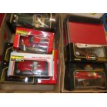 Two trays containing a quantity of various 1/18 and 1/24 scale Burago modern issue diecast to
