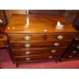 A Regency mahogany square front chest of two short over three long graduated drawers on splayed