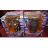 A pair of boxed Dr Who radio controlled daleks