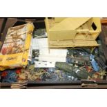 A quantity of various mixed scale mainly Airfix related military soldiers and vehicles to include