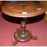 A Victorian circular pedestal low fixed tripod occasional table, dia. 40cm