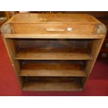 A 1930s oak bookshelf having single long upper drawer, width 90.5cm