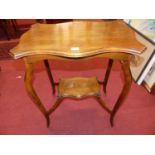 An Edwardian beech shaped top two tier occasional table, width 59cm