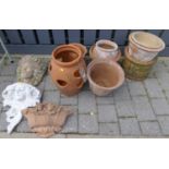 A collection of eight various plant pots, mostly terracotta, together with three sundry terracotta
