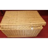 A contemporary wicker laundry basket with cover, width 88cm