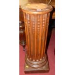 A painted terracotta fluted plant stand on square base (comprised of two sections), overall height