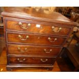 A 19th century mahogany commode chest with hinged upper action, width 83cm