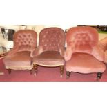 A collection of three various similar Victorian pink dralon button-back tub nursing chairs on turned