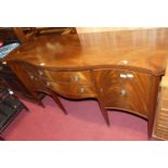 A contemporary Regency style mahogany serpentine front sideboard, width 156.5cm