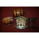 A collection of mixed effects to include wall clock, reproduction oak barrel foot stool and one