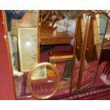 A pair of circa 1900 mahogany and satin wood strung arched narrow wall mirrors, each 123 x 35cm,