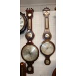 Two similar Regency mahogany four dial wheel barometers, the first signed W Martinelli, 2 King