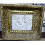 A reproduction composition wall plaque in heavy gilt frame, gross dimensions 40 x 44cm