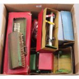 Large box containing Hornby 0-gauge items. Some early clockwork track; some pre-war electric